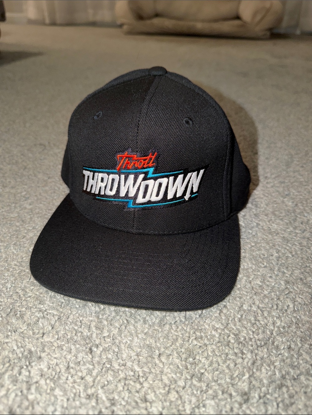The Classic Black Throwdown Embroidered Snapback Hat